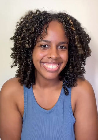 Video of model applying BOUNCE.ME Curl Balm, revealing soft, defined curls with shine and bounce.