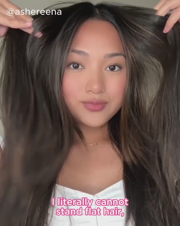 Video of content creator Ashereena Faye using PUFF.ME dry texture spray to achieve voluminous hair