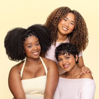 Models with different curly hair types (4C curls, 3B curls, 2B curls)