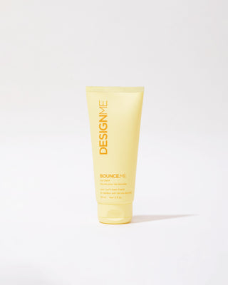 Front view of travel-size BOUNCE.ME Curl Balm bottle, compact and sleek design.