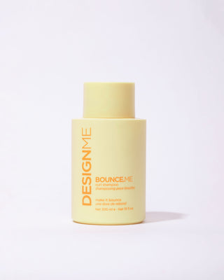 DESIGNME BOUNCE.ME Curl Shampoo bottle shown from the front.