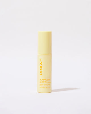 Front view of travel-size BOUNCE.ME Curl Spray Gel bottle, compact and sleek.