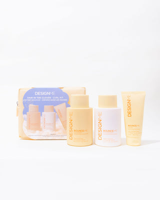 Front view of BOUNCE.ME Curl Definition Holiday Set. Includes BOUNCE.ME curl shampoo, BOUNCE.ME curl conditioner, and BOUNCE.ME curl balm.