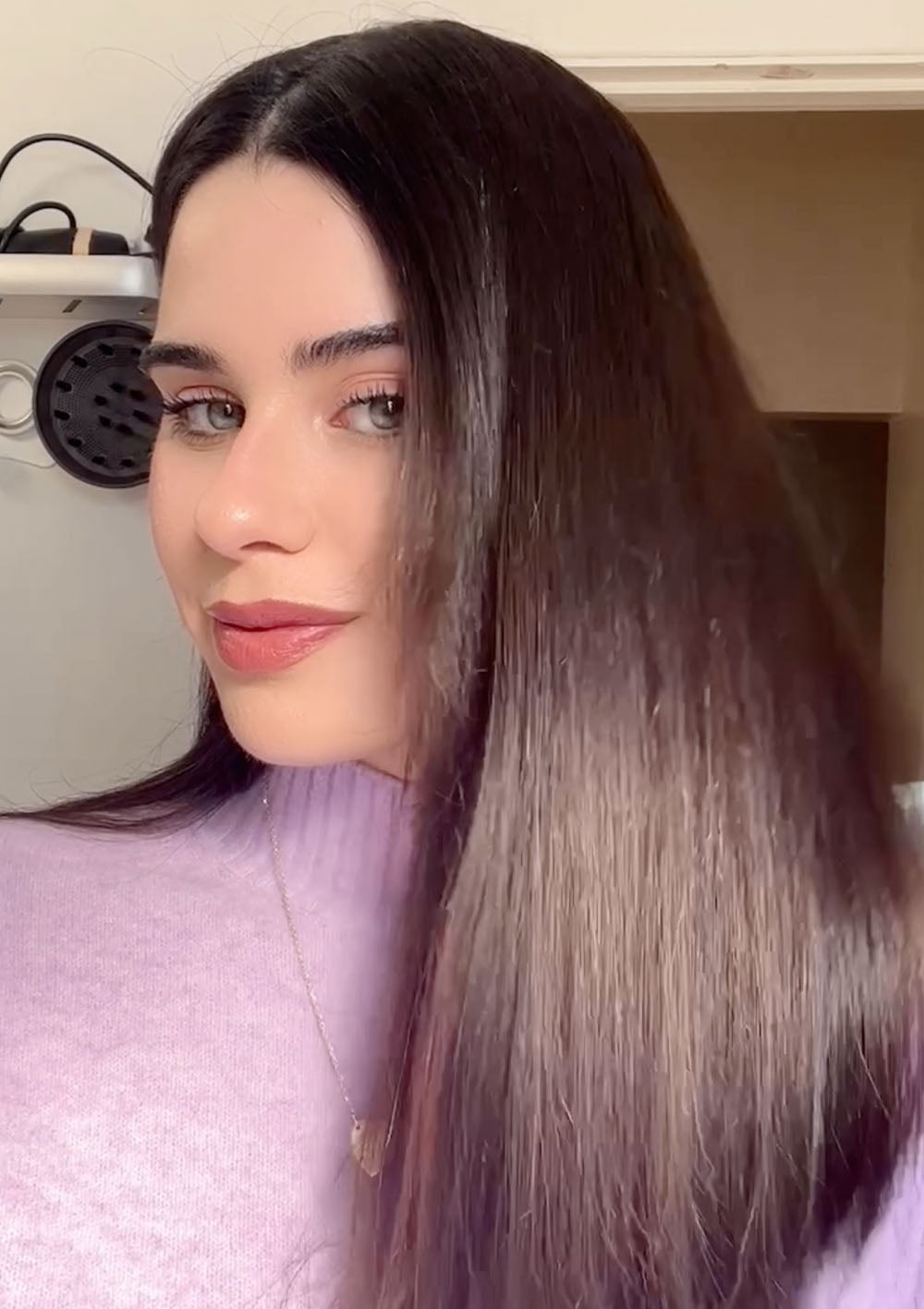 Video showing use of FAB.ME leave-in treatment as a heat protectant before blowdrying. Results show smooth, frizz-free hair with reduced split ends.