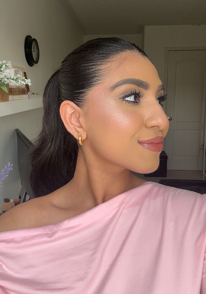 Updo hair tutorial video using DESIGNME HOLD.ME Styling Stick for styling, hold, glossy, flake-free finish.